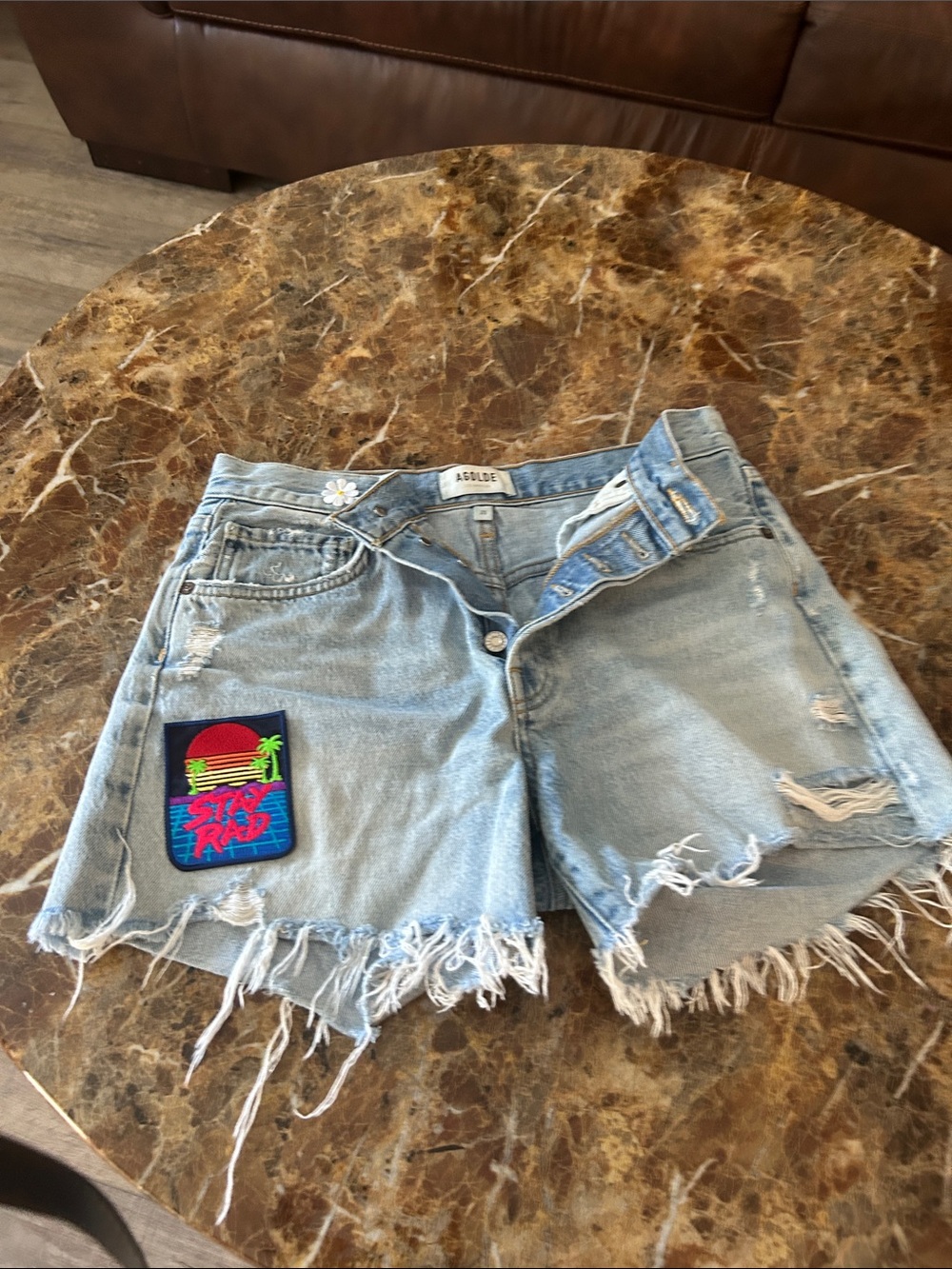 Agolde Light Wash Distressed Denim Shorts with Patch